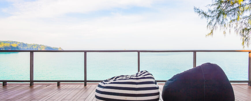 composite decking with a flawless, hidden-fastener finish on a luxury waterfront terrace